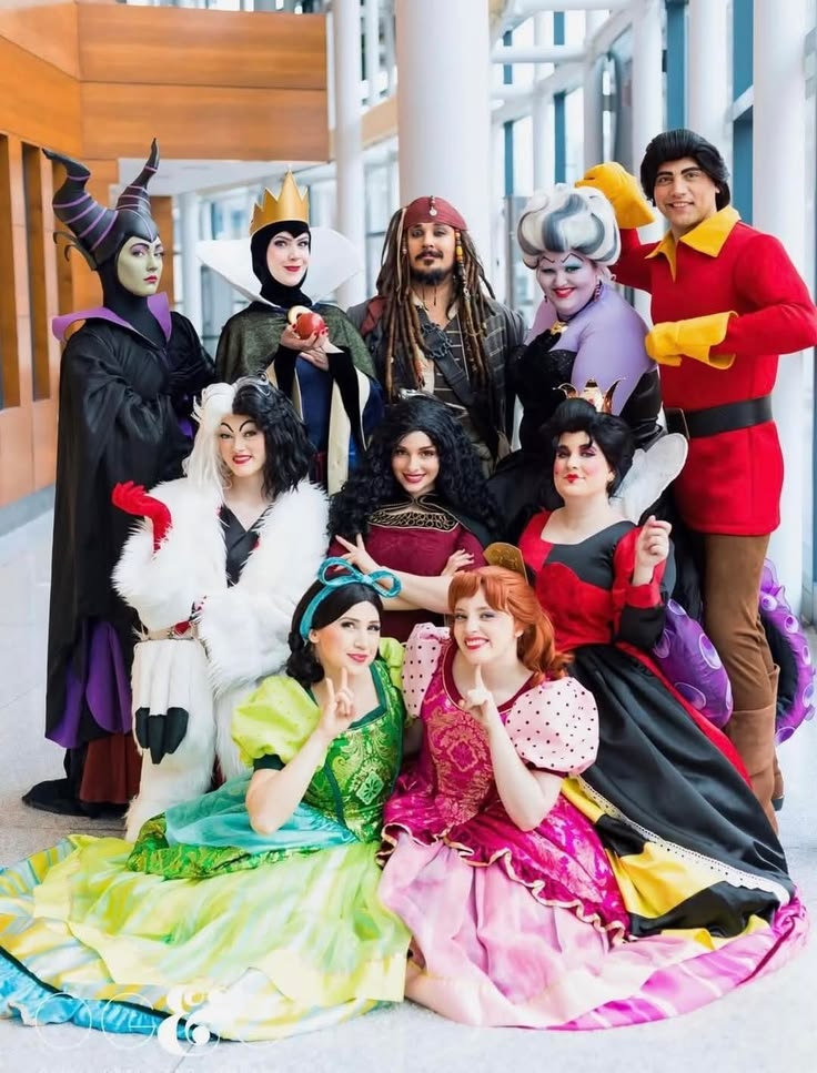 This may contain: a group of people dressed up as disney characters